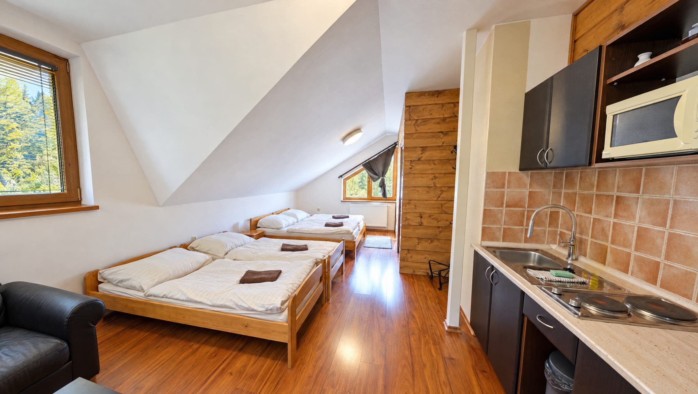 Lôžka v drevenom apartmáne